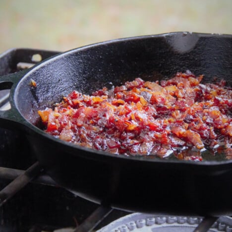 Bacon jam in a cast iron skillet ready to be served.