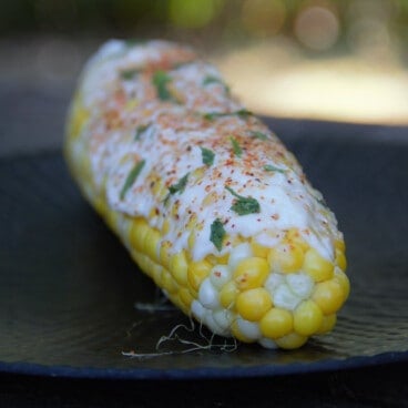 A ready to eat grilled elote ( Mexican Street Corn)