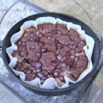 Looking down on a full Dutch oven of cooked chocolate cherry dump cake.