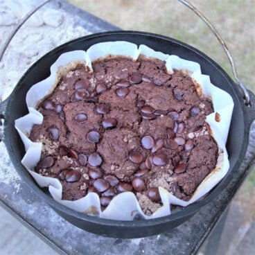 Looking down on a full Dutch oven of cooked chocolate cherry dump cake.