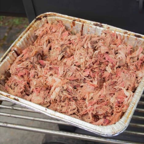 Shredded pull pork in a half pan.