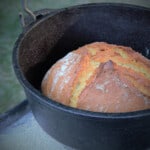 Soda Bread in a Dutch oven fully cooked and ready to serve.