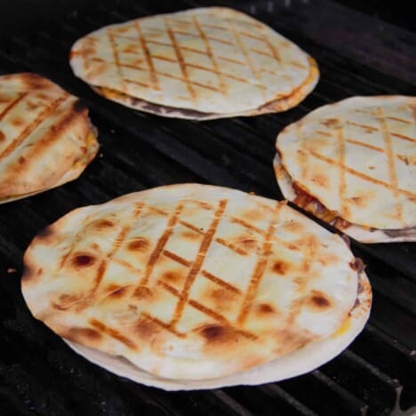 Even diamond grill marks on the top of the quesadillas while the other side is cooking on the grill.