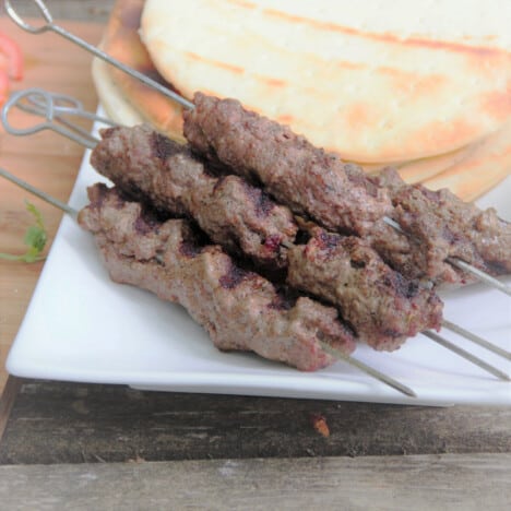 Fully cooked Grilled Beef Kebabs rest waiting to be served.