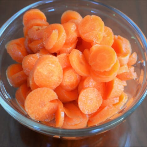 Homemade pickled carrots are drained and ready to serve.