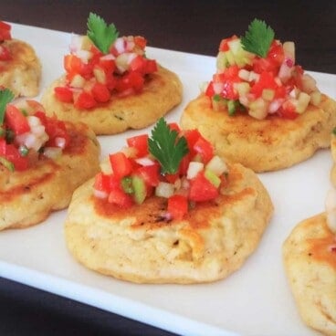 This recipe is a scratch made corn cake that includes fresh corn kernels that is then topped with a cucumber and tomato pico de gallo. #bushcooking #corncakes #picodegallo