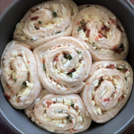 Jalapeño Popper Rolls are risen in a Dutch oven and ready to bake.