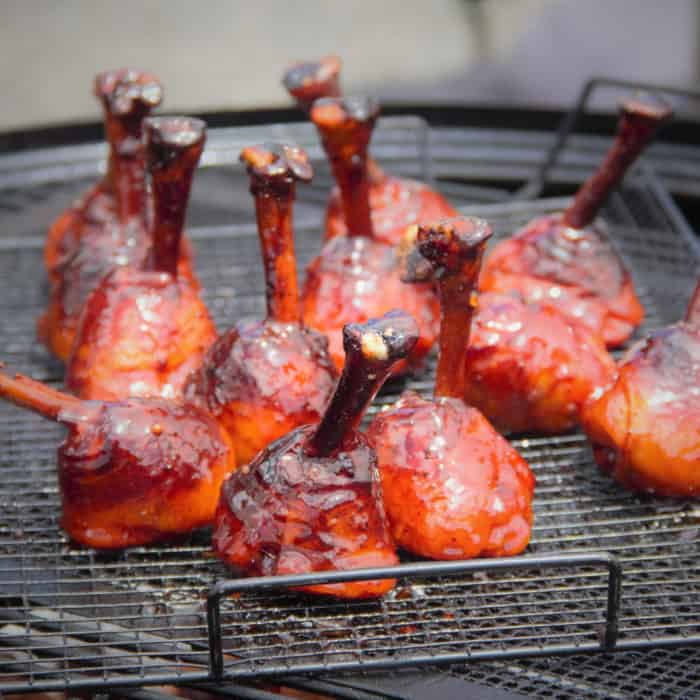 Barbecued chicken sitting in a smoker