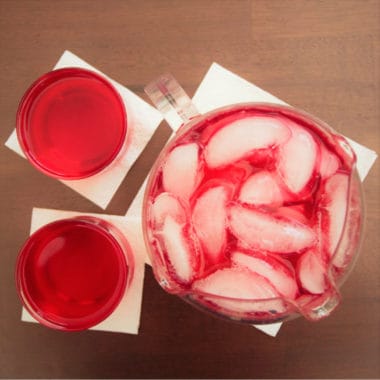 Areal photo of a drink pitcher and two glasses