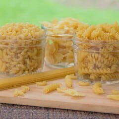 Different types of dried pasta in jars
