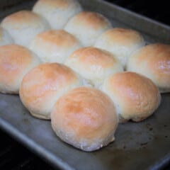 A baking sheet of golden brown rolls.