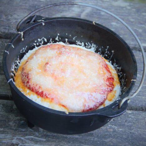 Cooked Tortilla lasagna sitting in the Dutch oven waiting to be served.