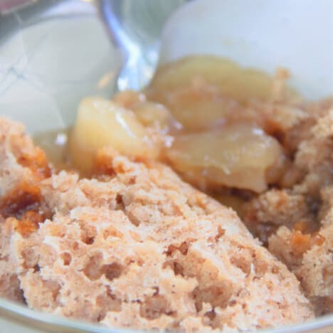 A close up shot of the apple spice dump cake highlighting the fluffiness of the cake.