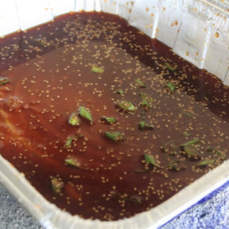 A foil tray with the kalbi maranade in it.