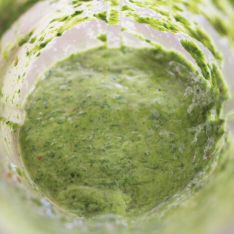 Looking down into a blended pineapple chimichurri.