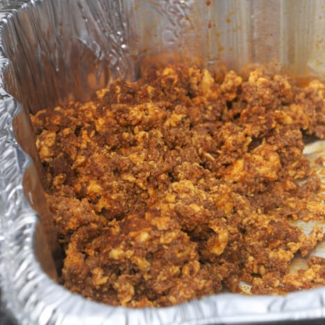 Aluminim foil pan filled with the chorizo and egg filling.